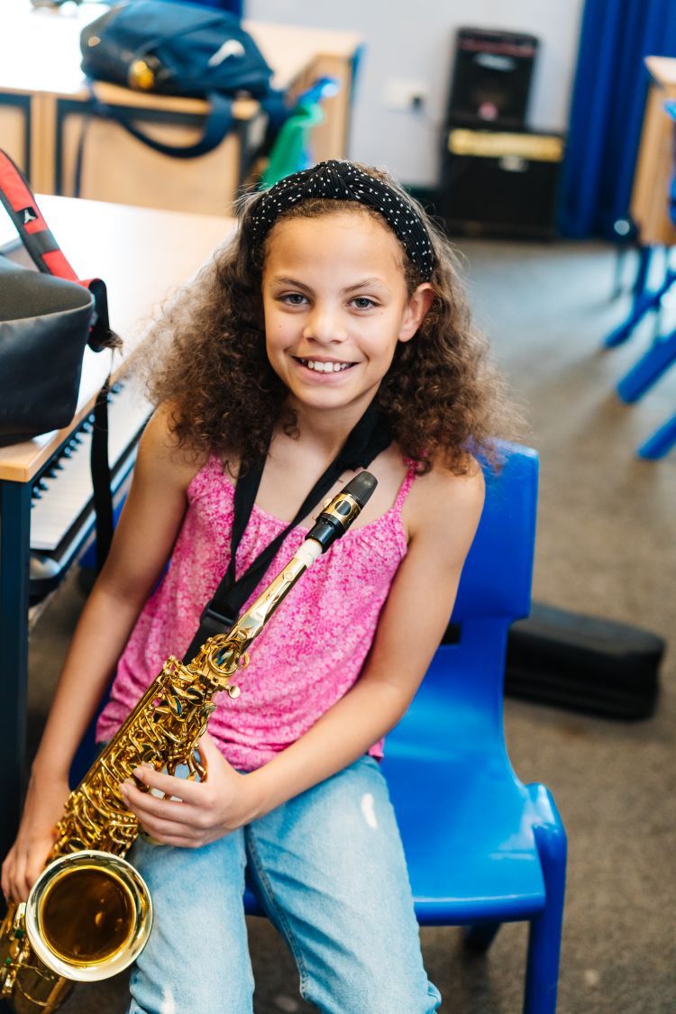 Girl with saxophone
